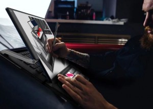Компания Compal представила концепт ноутбука с двумя экранами